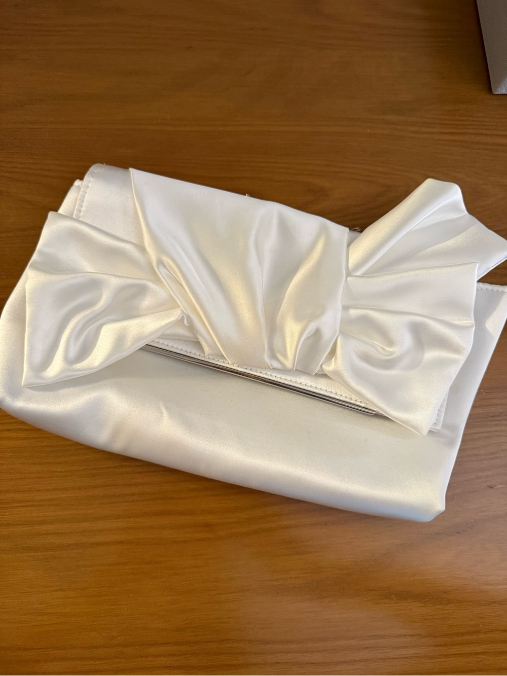 Ivory satin clutch